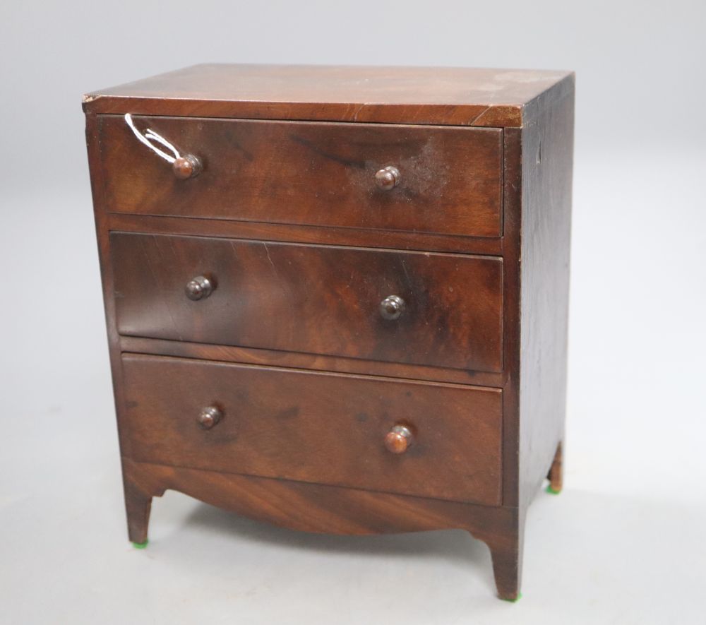 A mahogany Apprentice three drawer chest, height 25cm